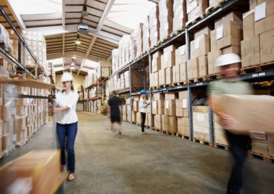 Dedicated staff in a bustling warehouse, efficiently managing stocks and inventory. Experience seamless control over your wholesale operations with our comprehensive management system.